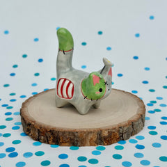 Zombie Cat with a Daisy on its Head