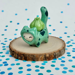 Kitty in a Bulbasaur Costume