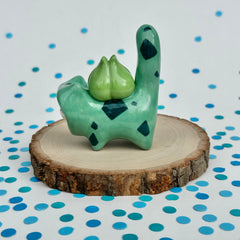 Kitty in a Bulbasaur Costume