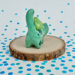 Kitty in a Bulbasaur Costume