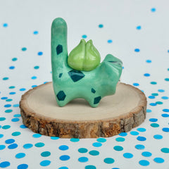 Kitty in a Bulbasaur Costume