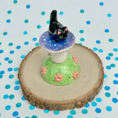 Black Itty Bitty with a Blue & Purple Mushroom