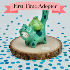 FIRST TIME ADOPTER - Kitty in a Bulbasaur Costume